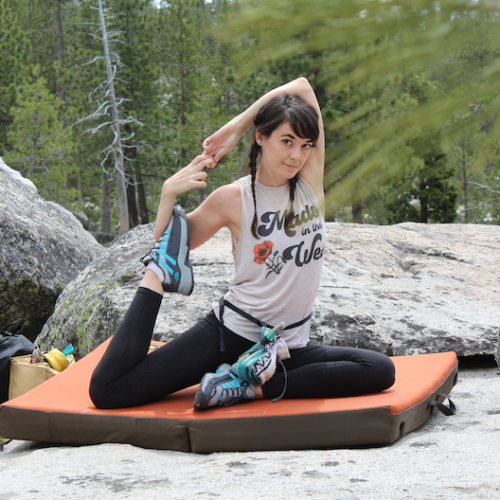 Aileen in an asana in the woods