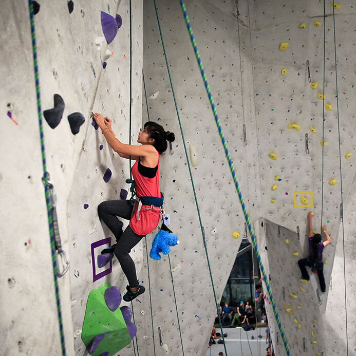 Women top-rope climbing