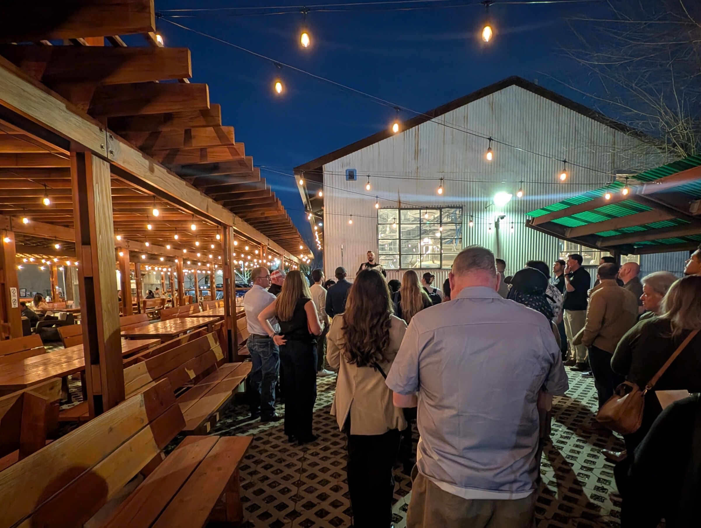 Outside space filled with event participants
