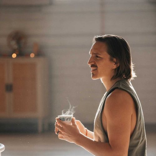 Bennet sitting with some tea